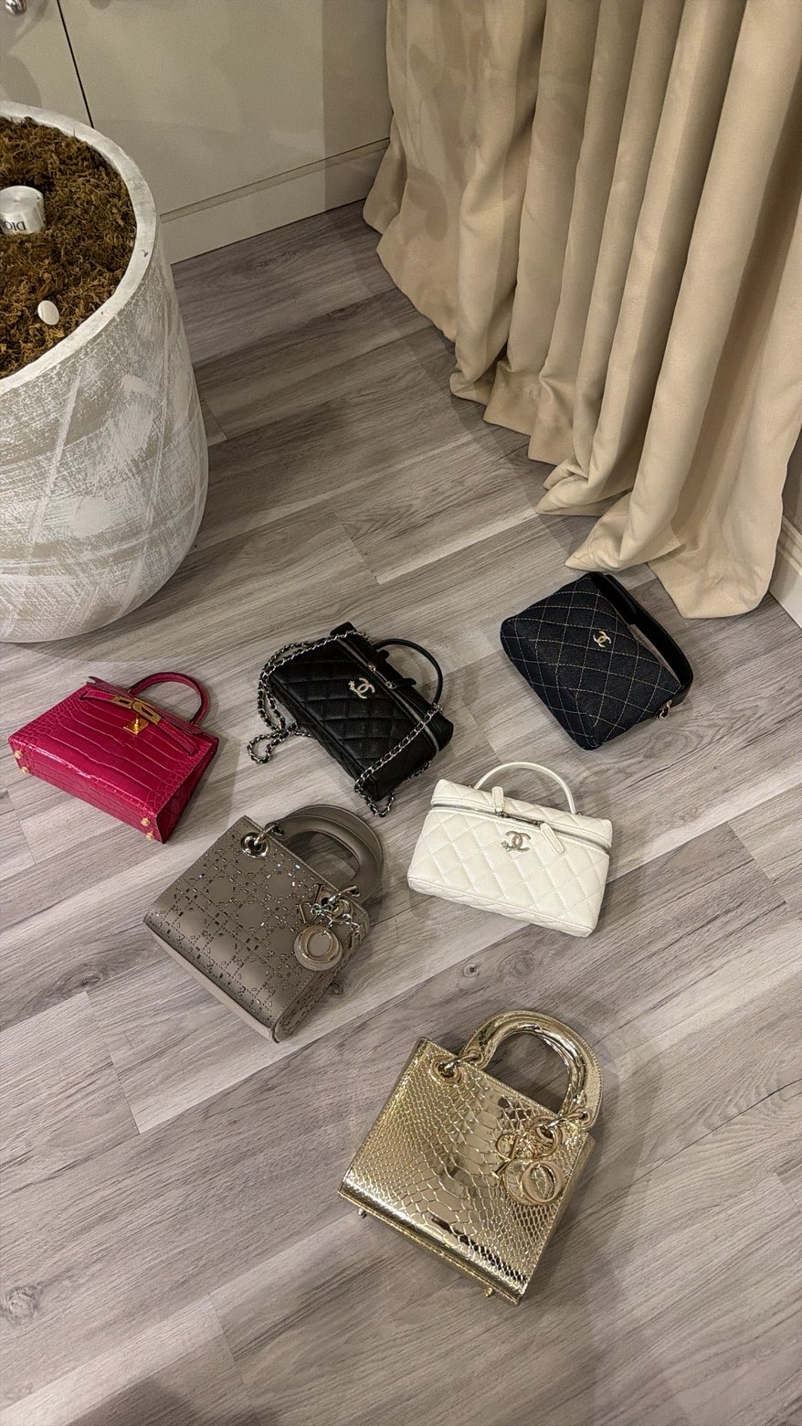 Designer items on warm neutral fabric
